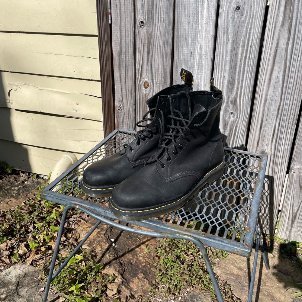 Doc Martens 1460 lace-up boots.